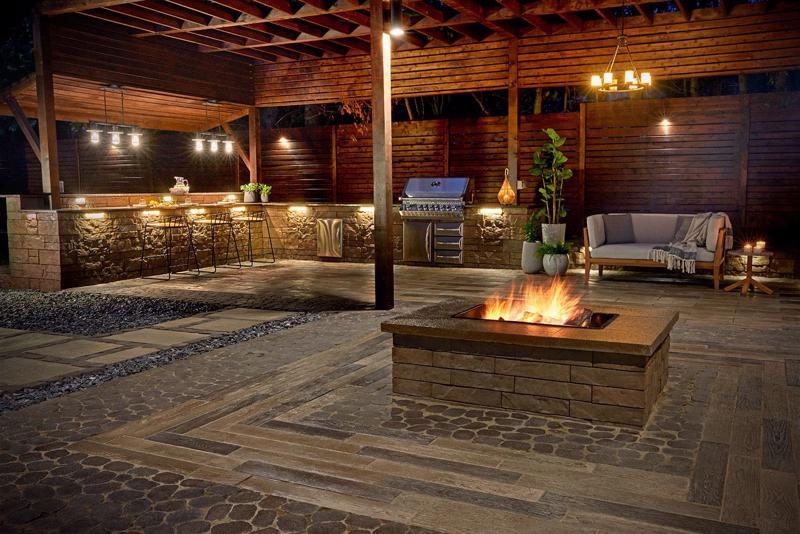 Outdoor firepit and living space by Bollman Landscape